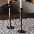 Brass Candlesticks with white taper candles